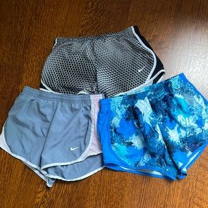 Three nike shorts for girls in the size medium
